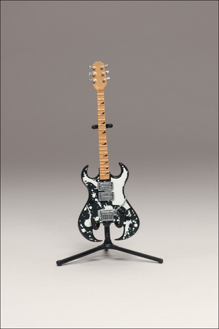 Illustration for article titled McFarlane's Tiny, Plastic Guitar Hero Guitars